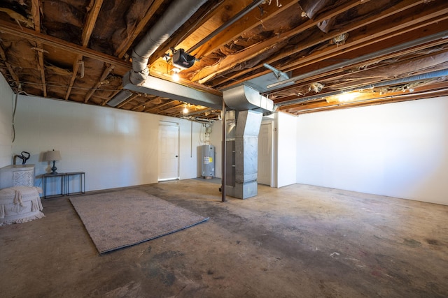 basement featuring heating unit and water heater