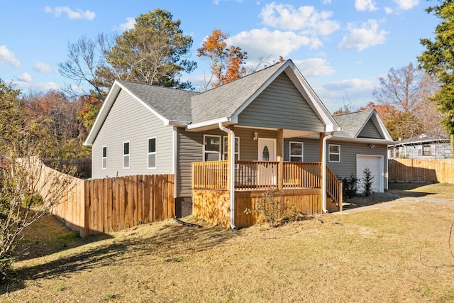 view of front of home with a porch and a garage