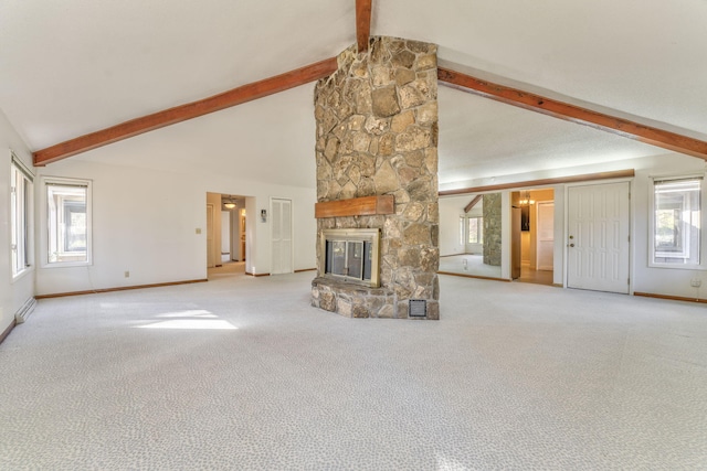 unfurnished living room featuring a fireplace, light colored carpet, high vaulted ceiling, and beamed ceiling