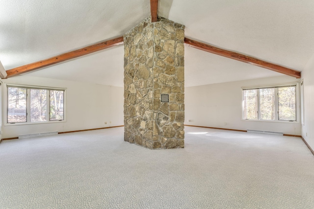 unfurnished living room with light carpet, vaulted ceiling with beams, a textured ceiling, a fireplace, and a baseboard radiator