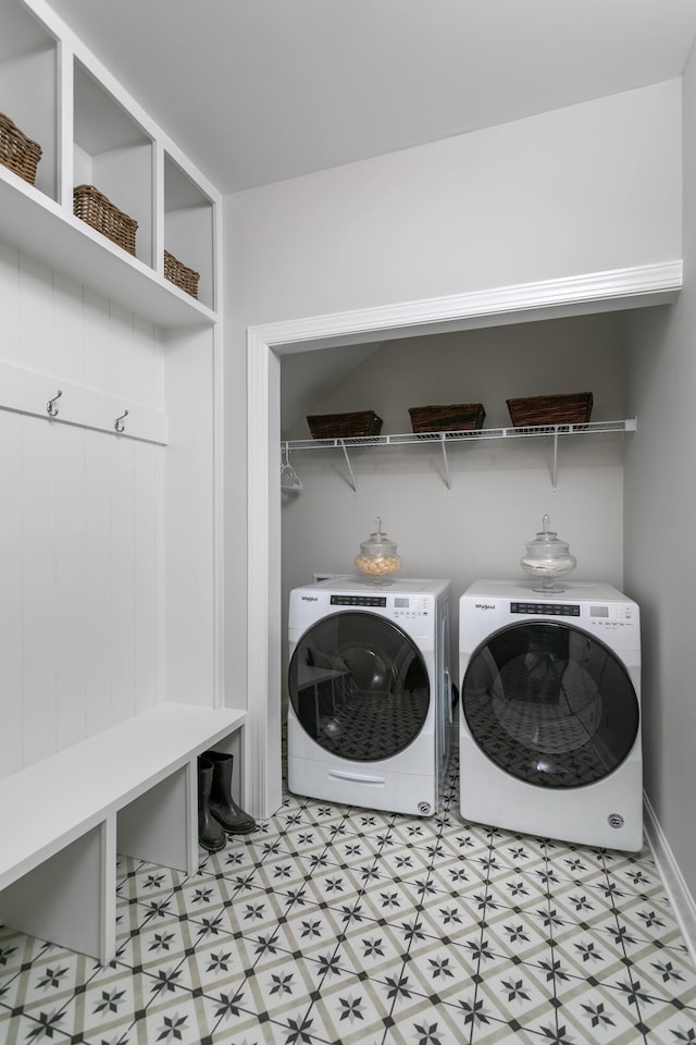 washroom featuring washing machine and dryer