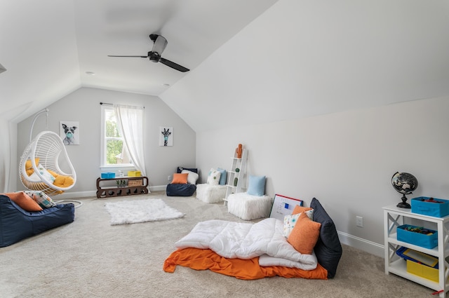 playroom featuring carpet, ceiling fan, and lofted ceiling