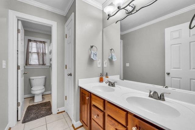 bathroom featuring toilet, tile patterned flooring, vanity, and ornamental molding