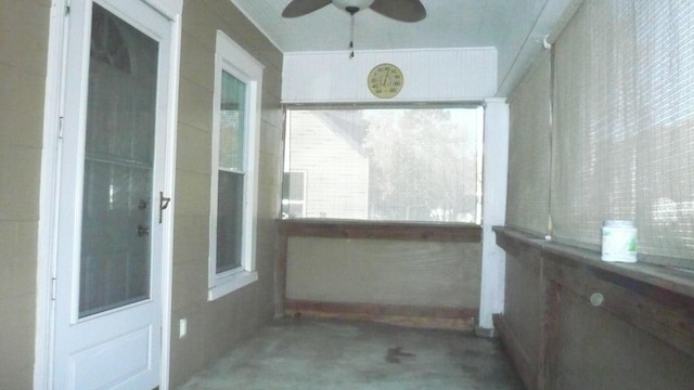 exterior space featuring ceiling fan