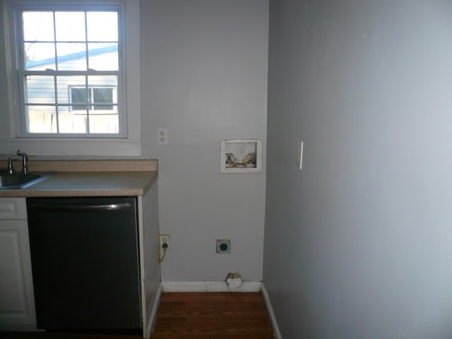 laundry area featuring washer hookup, dark hardwood / wood-style floors, electric dryer hookup, and sink