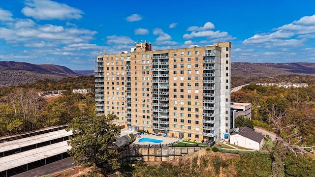 view of building exterior featuring a mountain view