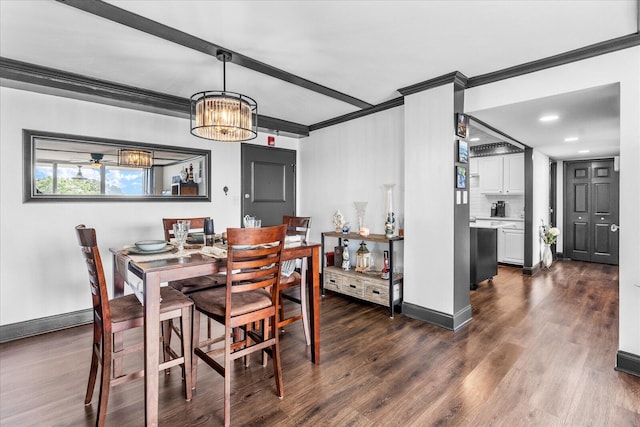 dining room with dark hardwood / wood-style flooring, ceiling fan with notable chandelier, and ornamental molding