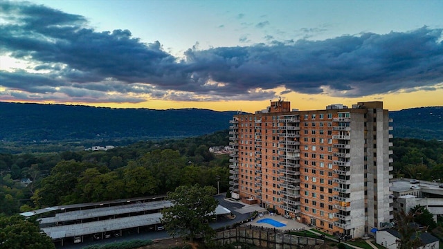 view of outdoor building at dusk