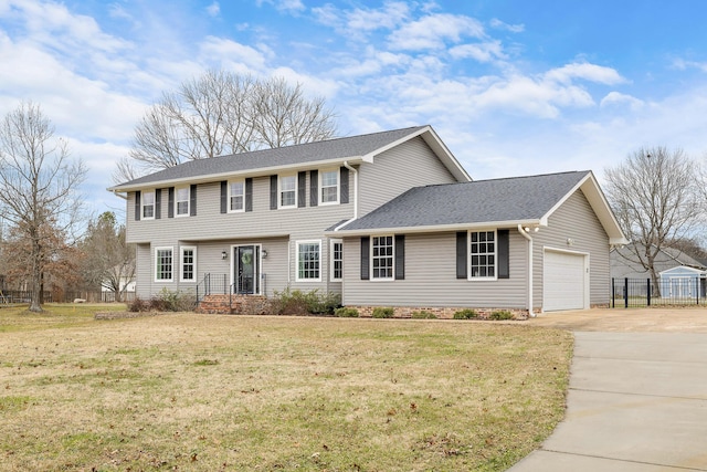 colonial-style house with a garage and a front lawn