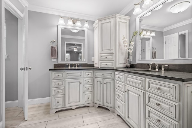 bathroom featuring vanity and crown molding