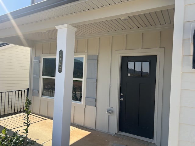 property entrance with a porch