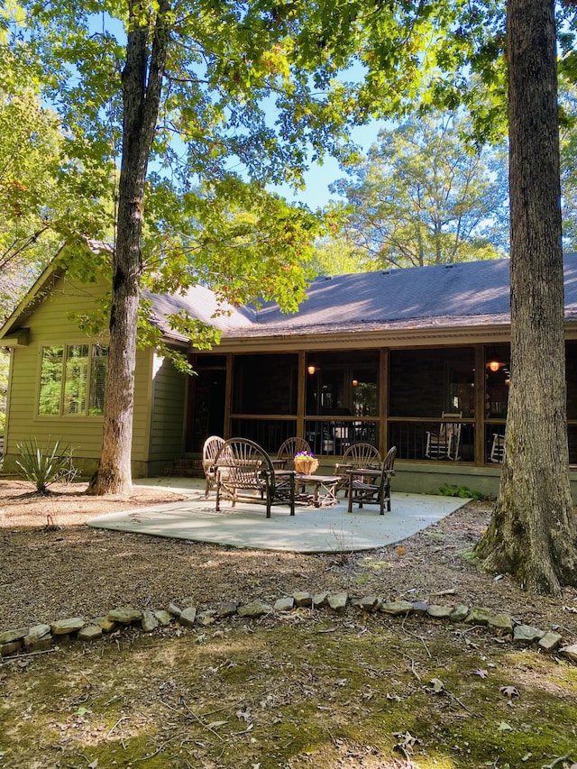 rear view of property with a patio area