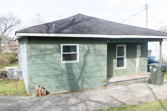 view of side of property with central AC unit