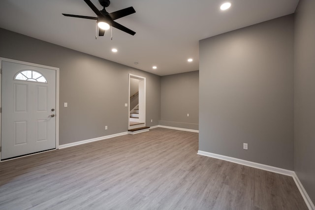 interior space featuring light hardwood / wood-style flooring and ceiling fan