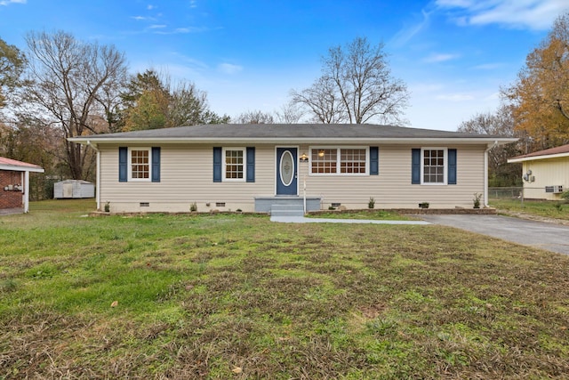 ranch-style house with a front yard