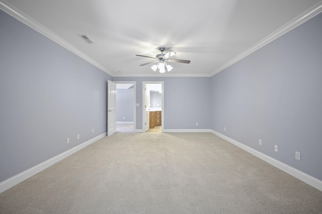 unfurnished bedroom with ceiling fan, light colored carpet, crown molding, and ensuite bath