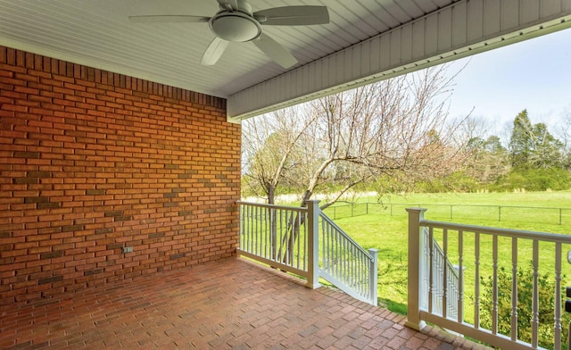 view of patio featuring ceiling fan