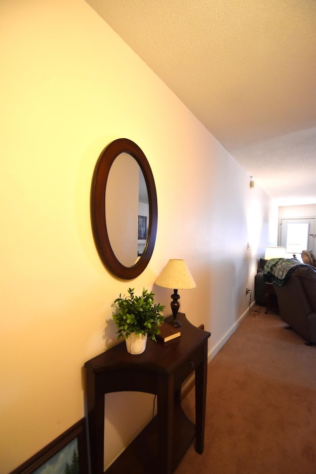 corridor featuring carpet flooring