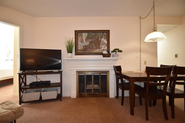 dining room featuring carpet