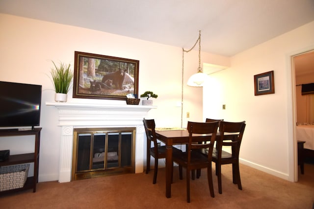 dining room with carpet flooring