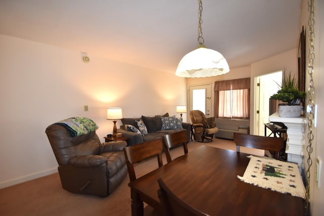 view of carpeted dining area