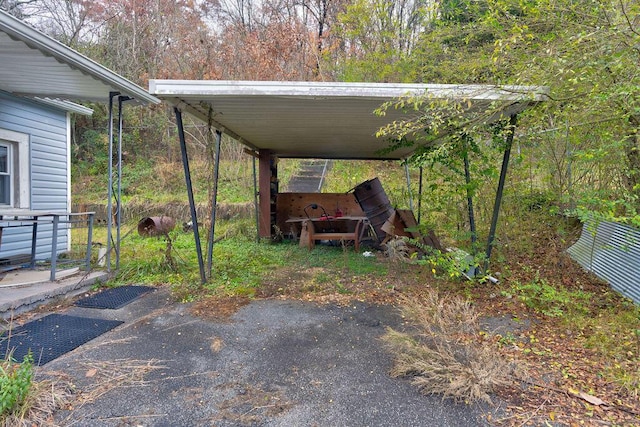 view of parking with a carport