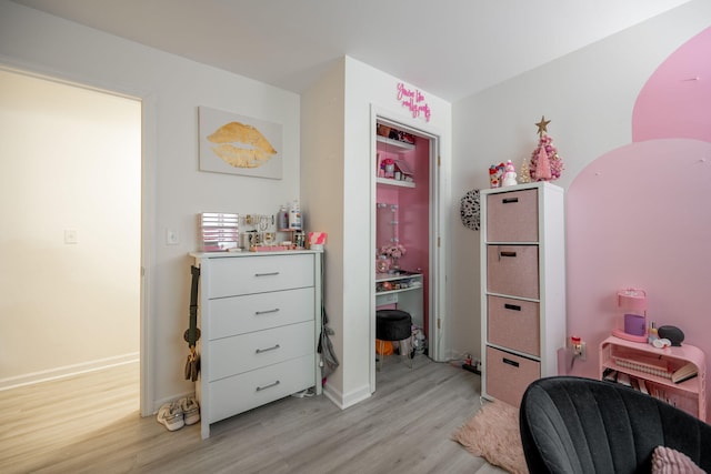 office space with light hardwood / wood-style floors