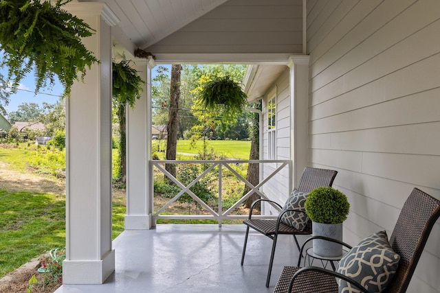 view of patio featuring a porch