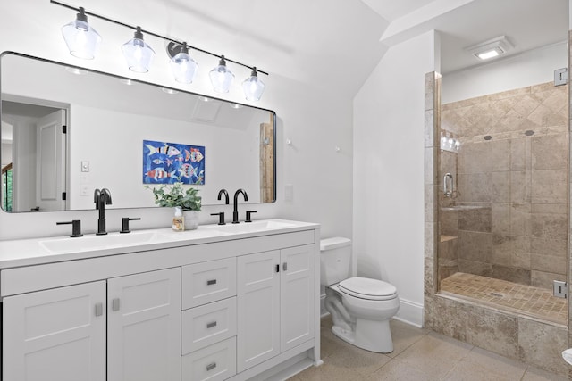 full bathroom featuring a sink, toilet, and a stall shower