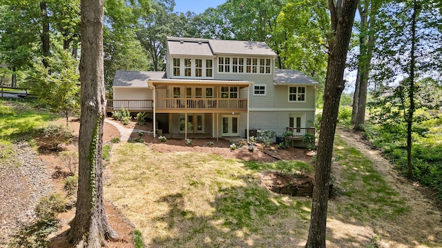 back of property with french doors and a deck