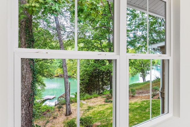 doorway to outside with a water view