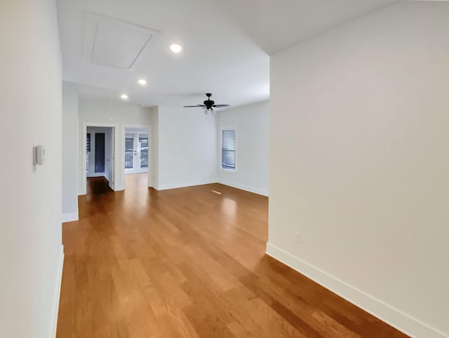 9693 W Ridge Trail Rd, Soddy Daisy, TN 37379 - unfurnished living room with attic access, baseboards, wood finished floors, recessed lighting, and ceiling fan