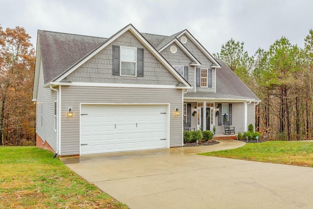 425 Wildewood Trl, Chickamauga, GA 30707 - view of front of property featuring a front yard, a porch, a garage, concrete driveway, and roof with shingles