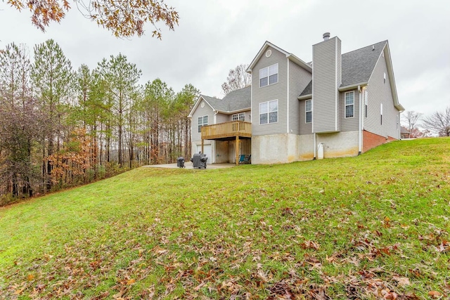 425 Wildewood Trl, Chickamauga, GA 30707 - rear view of property with a yard, a deck, and a chimney