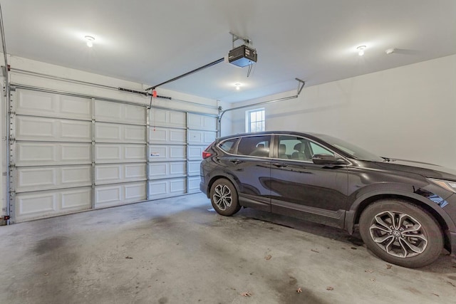 425 Wildewood Trl, Chickamauga, GA 30707 - garage featuring a garage door opener