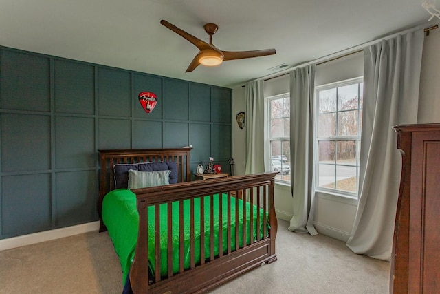 425 Wildewood Trl, Chickamauga, GA 30707 - bedroom featuring visible vents, baseboards, a decorative wall, a ceiling fan, and carpet floors