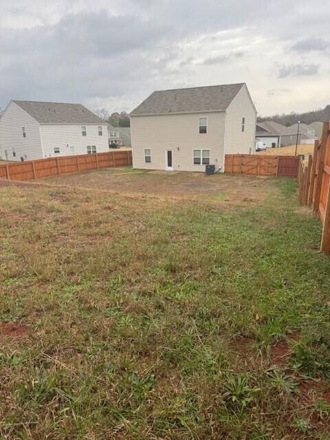 view of yard featuring central air condition unit