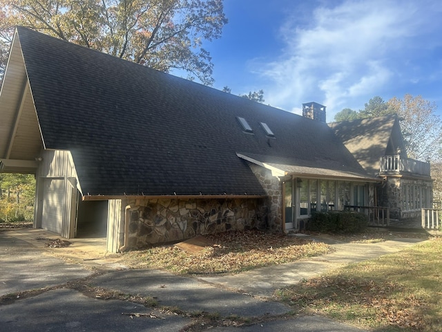 view of side of property featuring a garage