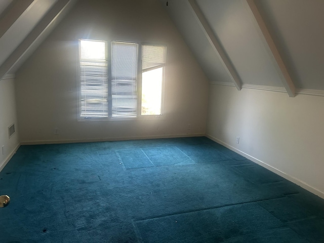 bonus room featuring carpet flooring and lofted ceiling with beams