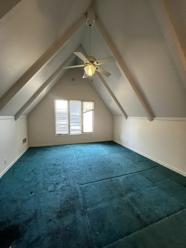 additional living space with carpet floors, vaulted ceiling, and ceiling fan