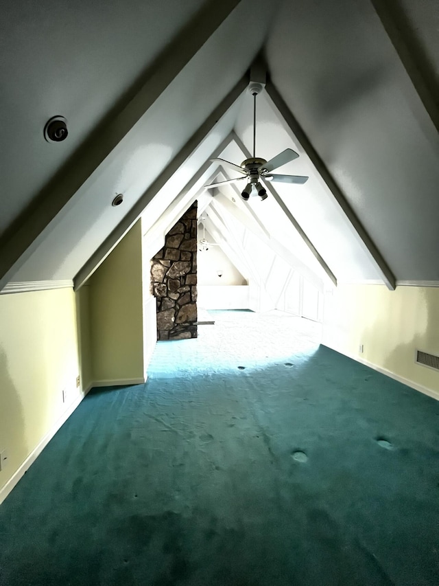 bonus room with carpet floors, ceiling fan, and lofted ceiling