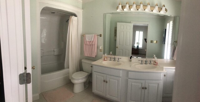 full bathroom with shower / bath combination with curtain, vanity, and toilet