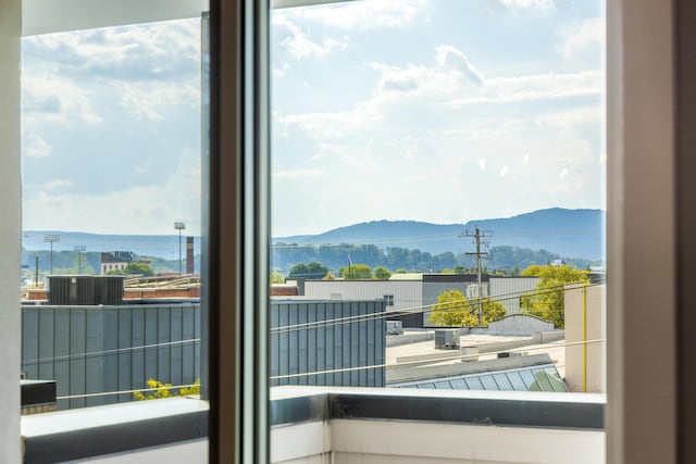 doorway featuring a mountain view