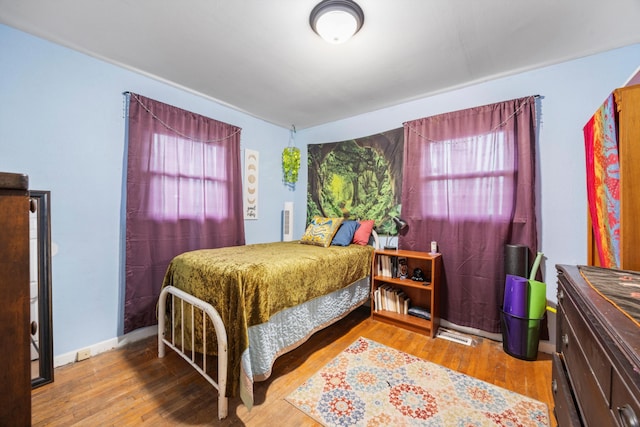 bedroom featuring hardwood / wood-style flooring