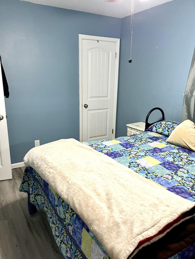 bedroom featuring wood-type flooring