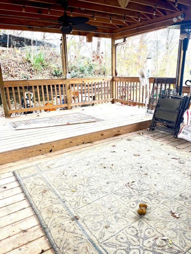 wooden terrace with ceiling fan