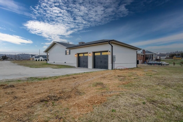 view of home's exterior featuring a garage