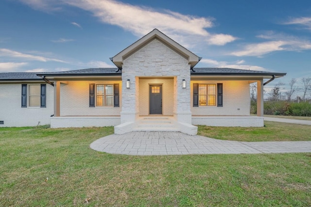 view of front of home with a front yard