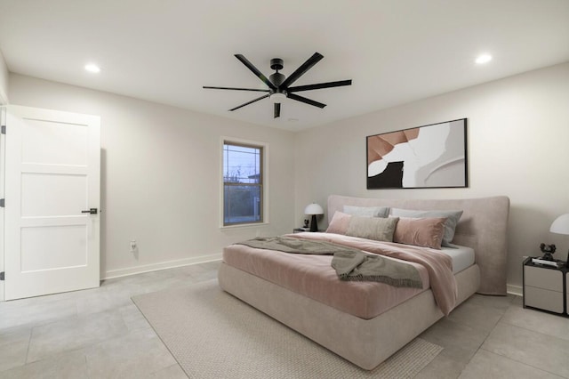 tiled bedroom featuring ceiling fan