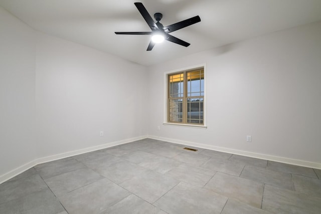 spare room featuring ceiling fan